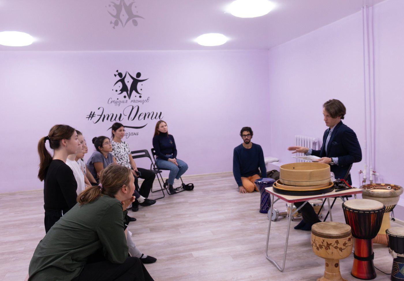 A talk on frame drums at a dance studio